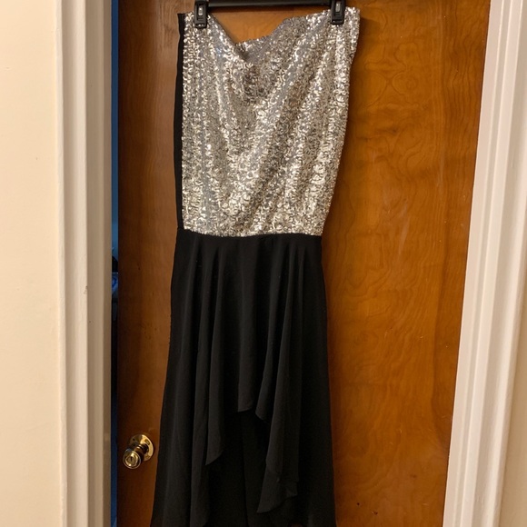 black dress with orange accessories